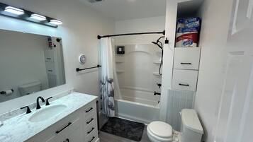 Hair dryer, towels, soap, toilet paper