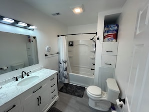 Hair dryer, towels, soap, toilet paper