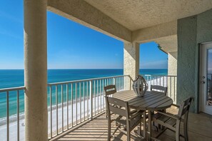 Outdoor dining - Stunning 2 Bedroom Beachfront Penthouse with 30ft Balcony & Free Chair Service! (Panama City Beach)
