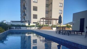 Deluxe Apartment, Jetted Tub, Beach View | Pool | Outdoor pool