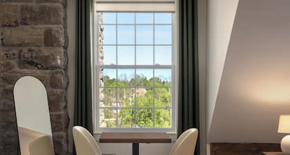 Tri Century Mill Suites