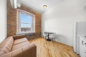 Room, 1 Queen Bed with Sofa bed | Living area - Tri Century Mill Suites (Carleton Place)