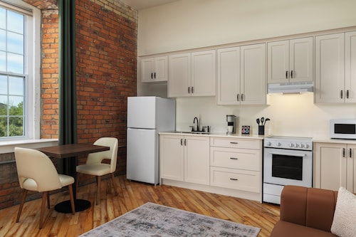 Tri Century Mill Suites