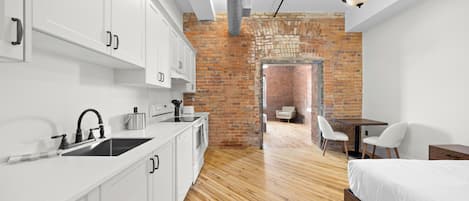 Suite, 1 Bedroom | Laptop workspace, free WiFi, bed sheets