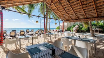 Beach nearby, white sand, sun loungers, beach umbrellas