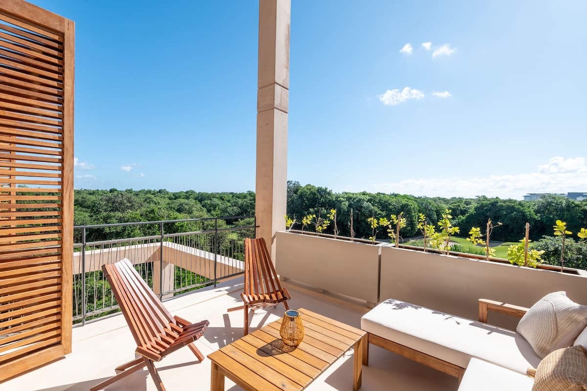 Appartement « Premier », 2 chambres, terrasse, vue golf | Vue de la chambre