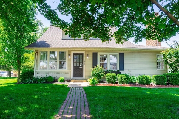 Home access is through the front door facing the road.
