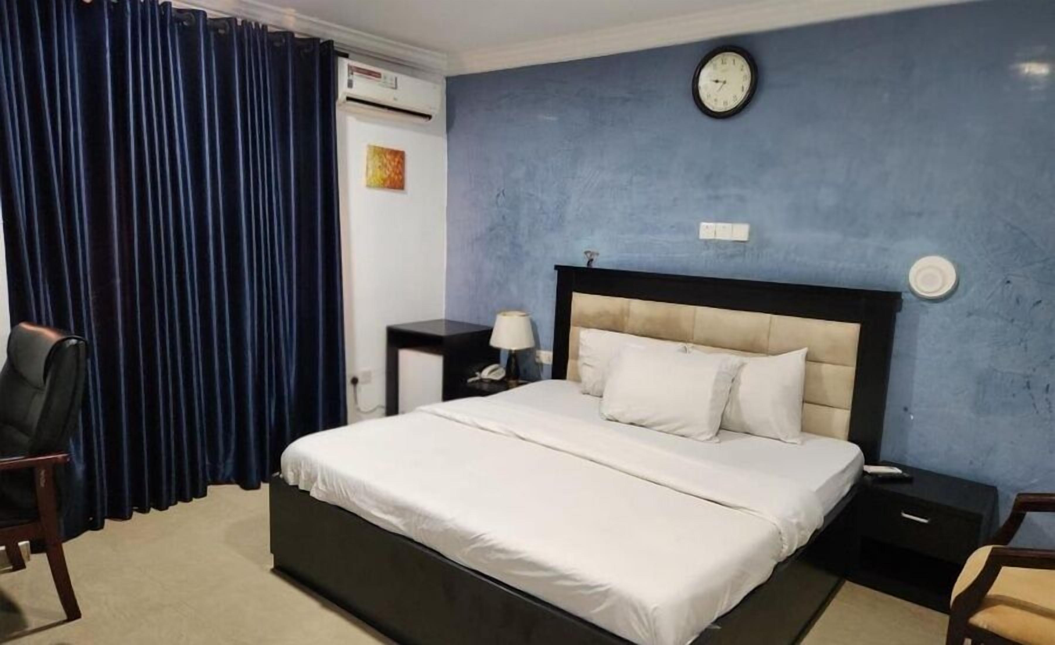 Economy Room, Balcony, City View | Desk, laptop workspace, blackout drapes, soundproofing