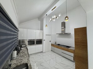 Luxury Villa | Private kitchen - Bryanston Luxury Secure 4BR Haven (Sandton)