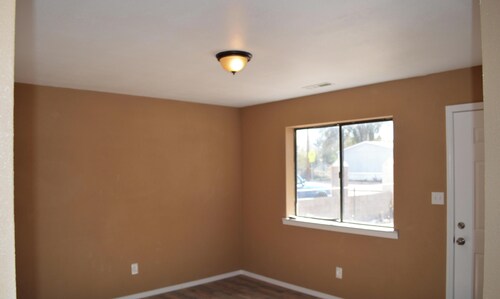 Cozy Single-Story Brown Bungalow