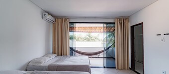 Casa Aruana, one block from the beach, with games and a large pool.
