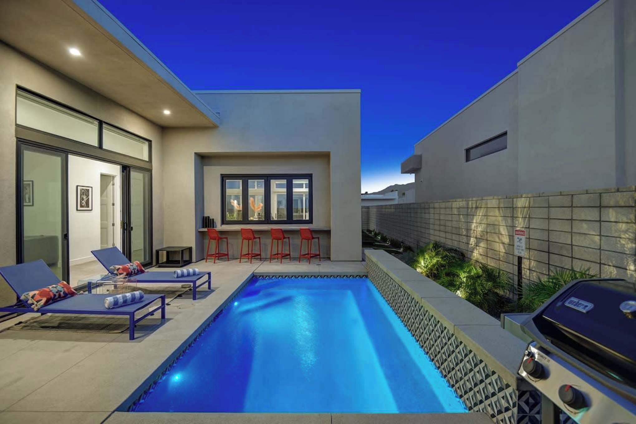 Your private oasis awaits under the desert sky—dive into the sparkling pool, lounge poolside, or gather at the built-in bar for sunset cocktails and grilled favorites.