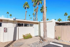 Modern desert retreat with iconic palm-lined entrance and mid-century architecture sets the stage for a classic Palm Springs getaway. - Retro Mid-Century Modern Retreat at Historic Ocotillo Lodge (Palm Springs)