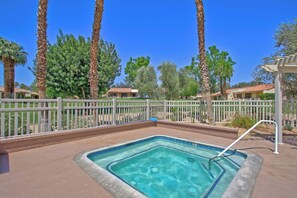 Soak away your cares in this sparkling hot tub, surrounded by swaying palms and sunshine. The peaceful garden setting creates your own private desert retreat. - Two Bedroom Holiday Home (Palm Desert)