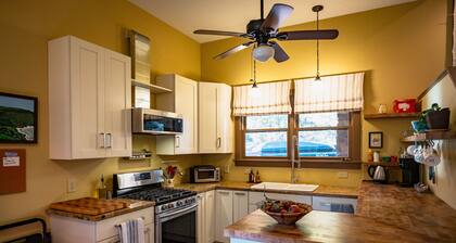Hazel Studio - King Bed Studio with Twin Bunkbeds in side room. Full kitchen, bathroom and covered front porch.