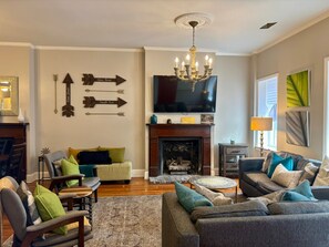 TV, books - Park Place, Unit A - 2BR near Forsyth w/Balcony, Courtyard, Easy Street Parking (Savannah)