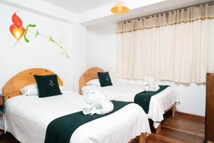 Comfort Triple Room, Balcony, Courtyard View | Desk, laptop workspace, free WiFi