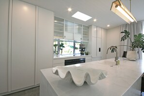 Fridge, microwave, dishwasher, coffee/tea maker - Shoreline Vista - New Plymouth Holiday Home (New Plymouth)