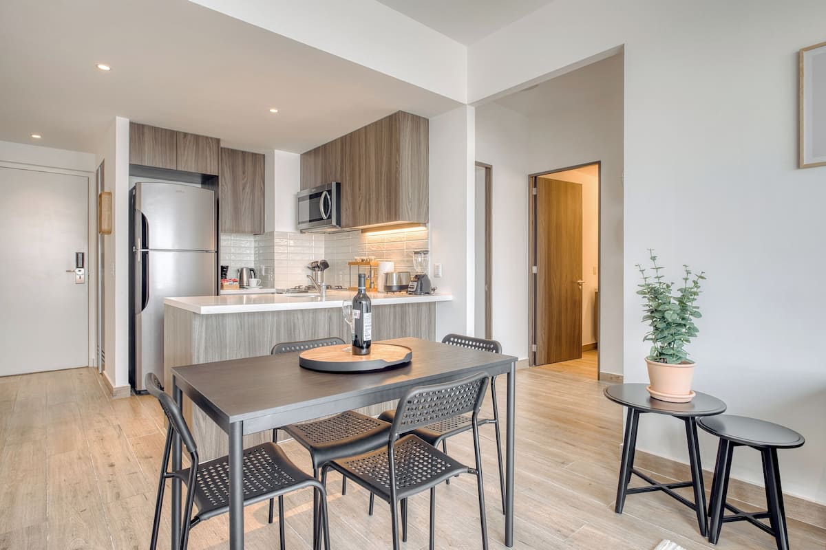 Apartamento, 2 quartos | Área de estar | Smart TV