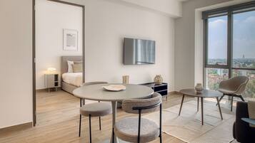 Apartamento grand | Área de estar | Smart TV