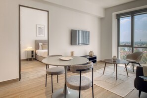 Apartamento grand | Área de estar | Smart TV