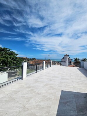 Comfort Suite, Patio | Living area - CAIPORA HOSTEL PRAIA (Saquarema)