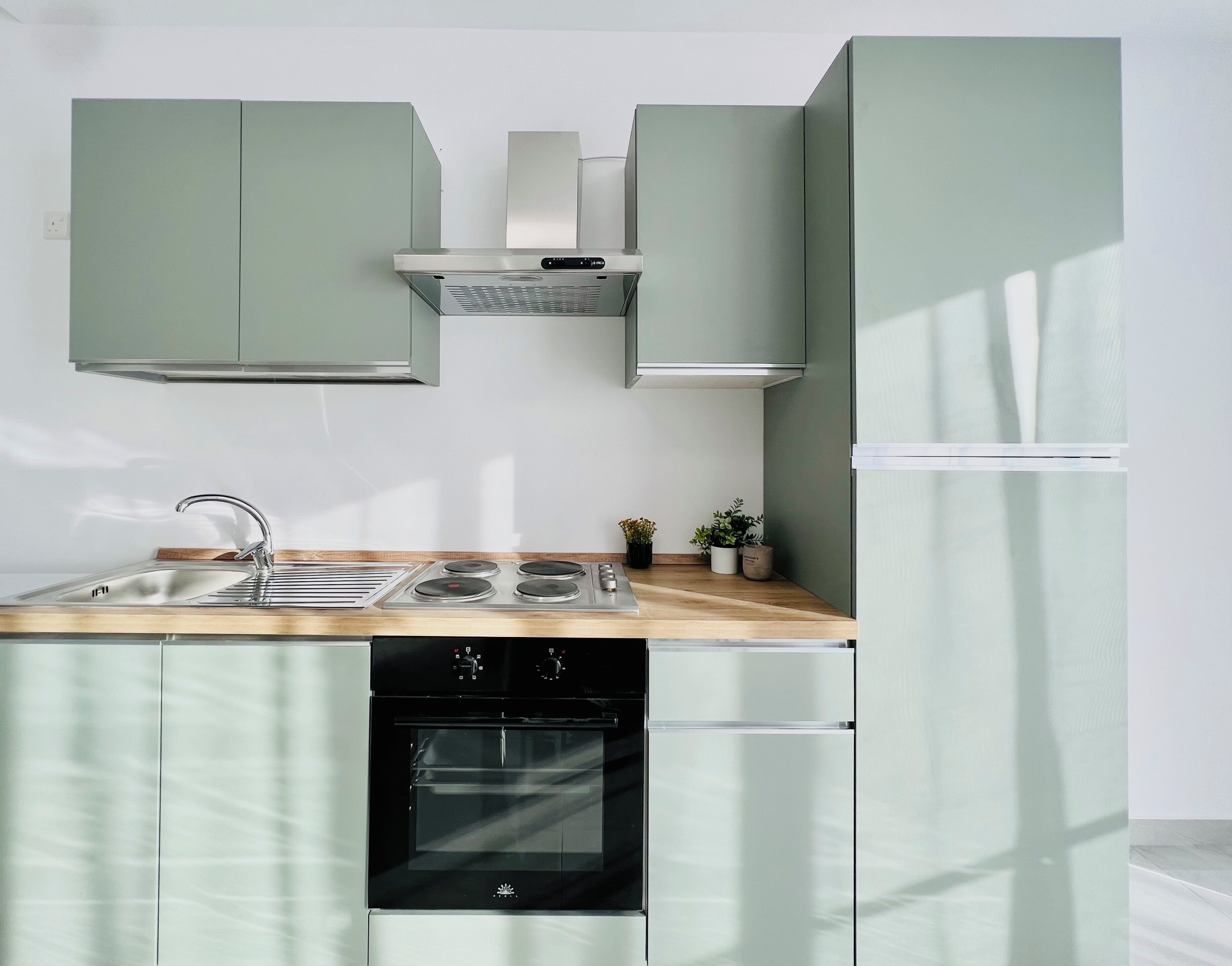 Premium Apartment, City View | Private kitchen | Full-size fridge, oven, stovetop, cookware/dishes/utensils