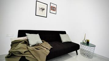 Deluxe-Apartment, Stadtblick | Wohnbereich