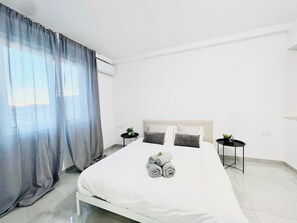 Monolocale City, vista città | Ferro/asse da stiro, Wi-Fi gratuito