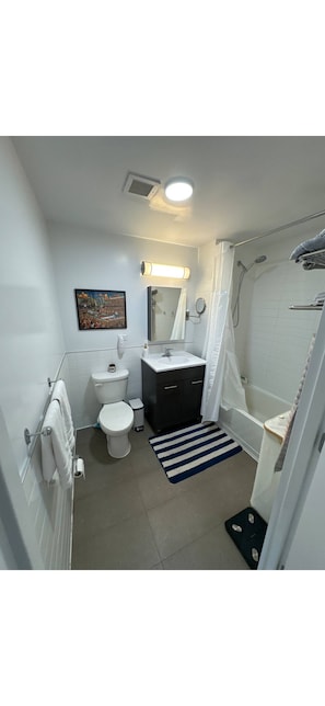Hair dryer, towels, soap, toilet paper