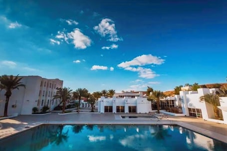 Outdoor pool. El Djanoub Hotel