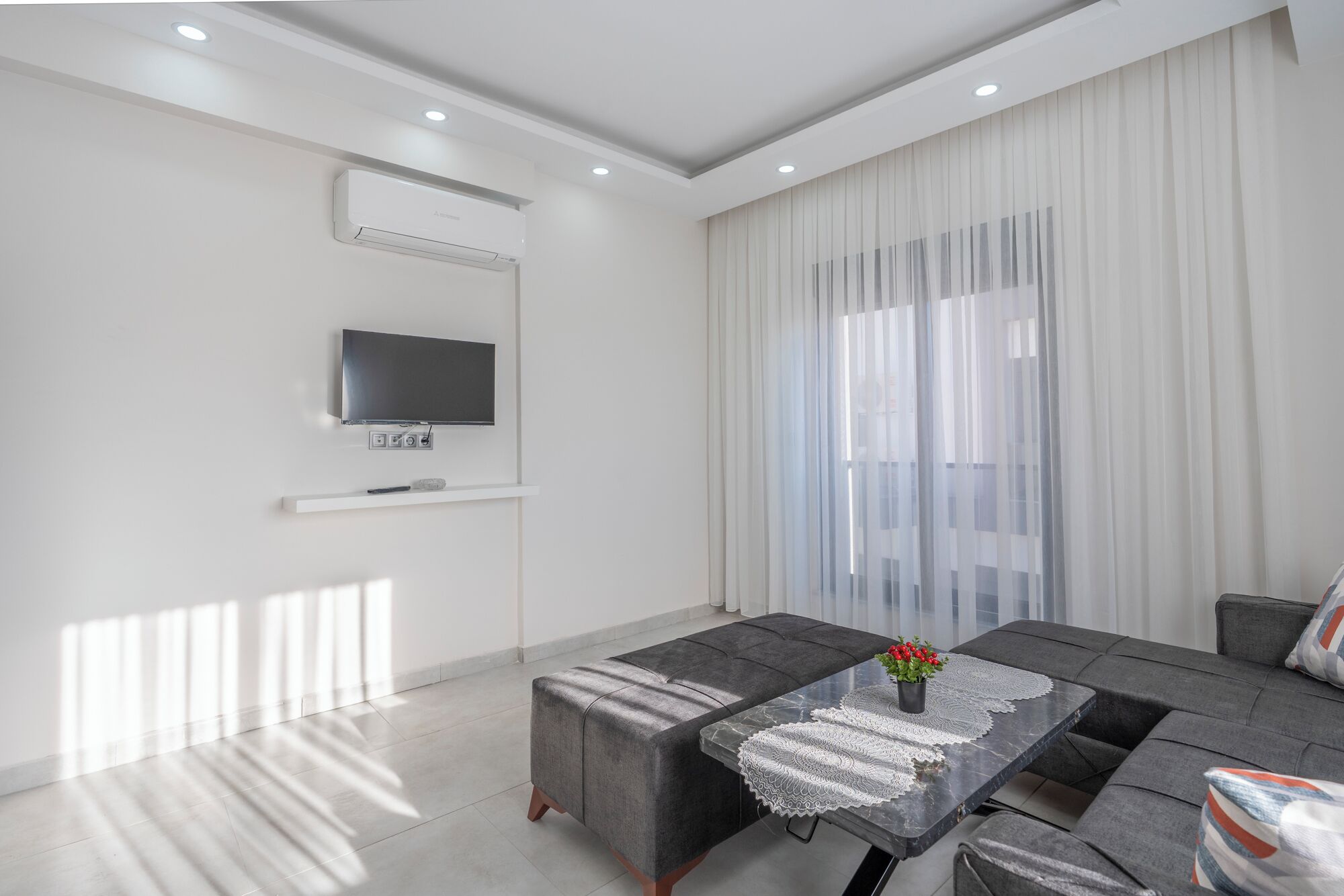 Căn hộ Deluxe | Khu phòng khách | Smart TV 