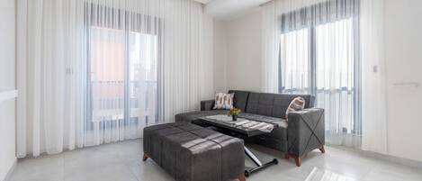 Deluxe-Apartment | Wohnbereich | Smart-TV