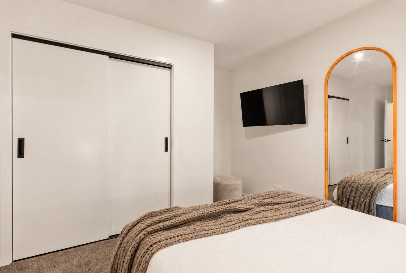 evara queenstown master bedroom TV