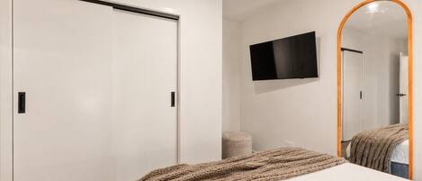 evara queenstown master bedroom TV