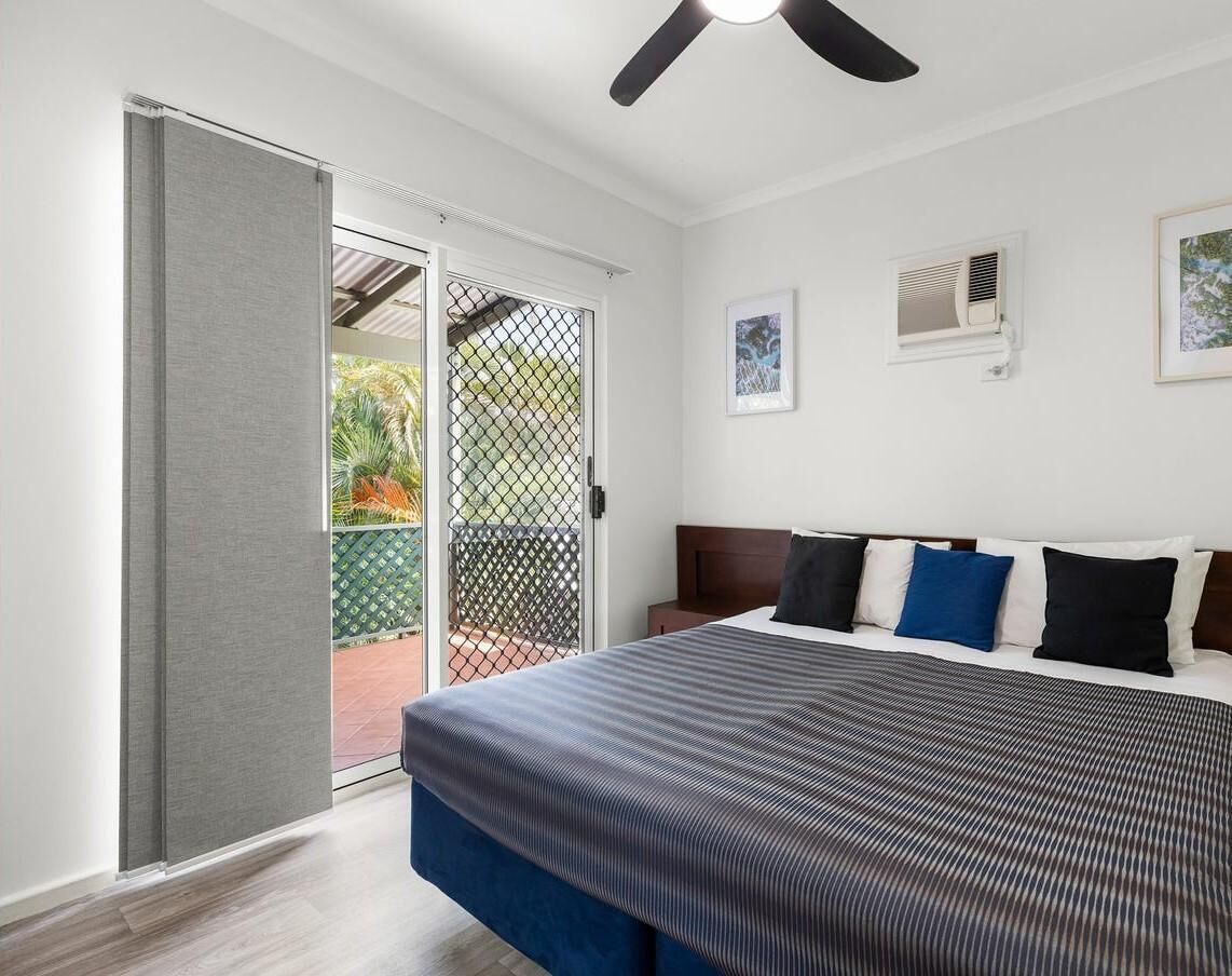 Bright and airy bedroom with private patio access