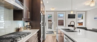 Modern 4-Bedroom Home Near Chinook Mall and Downtown with Private Garage!
