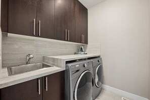 Interior - Modern 4-Bedroom Home Near Chinook Mall and Downtown with Private Garage! (Calgary)