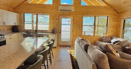 Four seasons, waterfront, private beach! Elegant cozy cabin lakeside retreat!