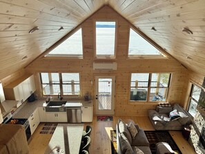 Smart TV, fireplace, books, stereo