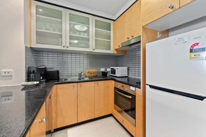 Fridge, microwave, oven, stovetop - Central Apartment with Underground Parking (Braddon)