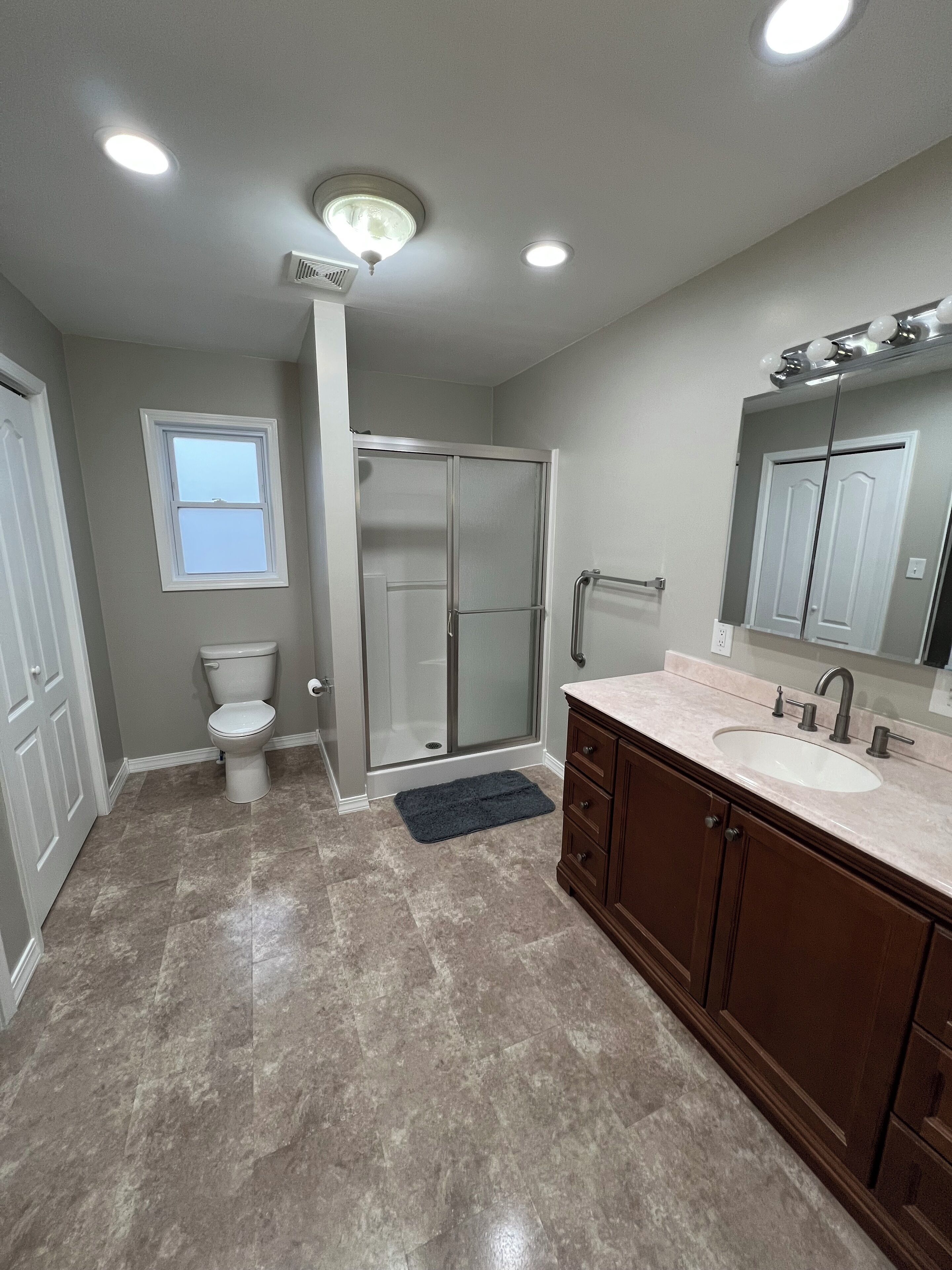Shower, towels, soap, toilet paper