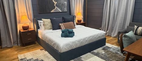 Tabla de planchar con plancha, wifi y ropa de cama