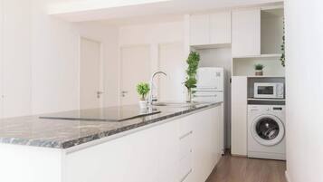 Microwave, coffee/tea maker, toaster, cookware/dishes/utensils