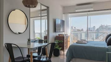 Fer et planche à repasser, draps fournis