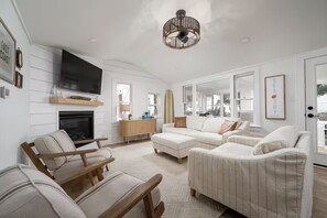 Smart TV, fireplace, books