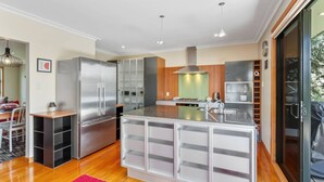 Fridge, microwave, oven, stovetop - Perfect Mission Bay Home | by Furnished Rentals (Auckland City)