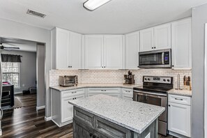 Fridge, microwave, dishwasher, coffee/tea maker - Private Pool and Volleyball Court on a Huge Lot Just Minutes from Navarre Beach - Dog Friendly (Navarre)