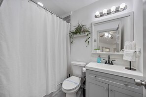 Hair dryer, towels, soap, toilet paper