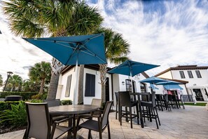 Outdoor dining - 6BR Windsor at Westside Home w/ Private Pool & Spa (Kissimmee)